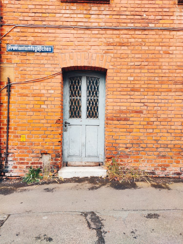 Door On A Brick Wall