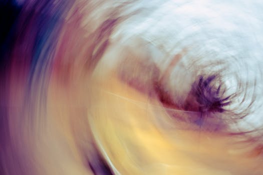 Colorful abstract swirl captured in dynamic, motion blur style.