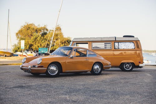 Vintage Car Parked Beside a Van