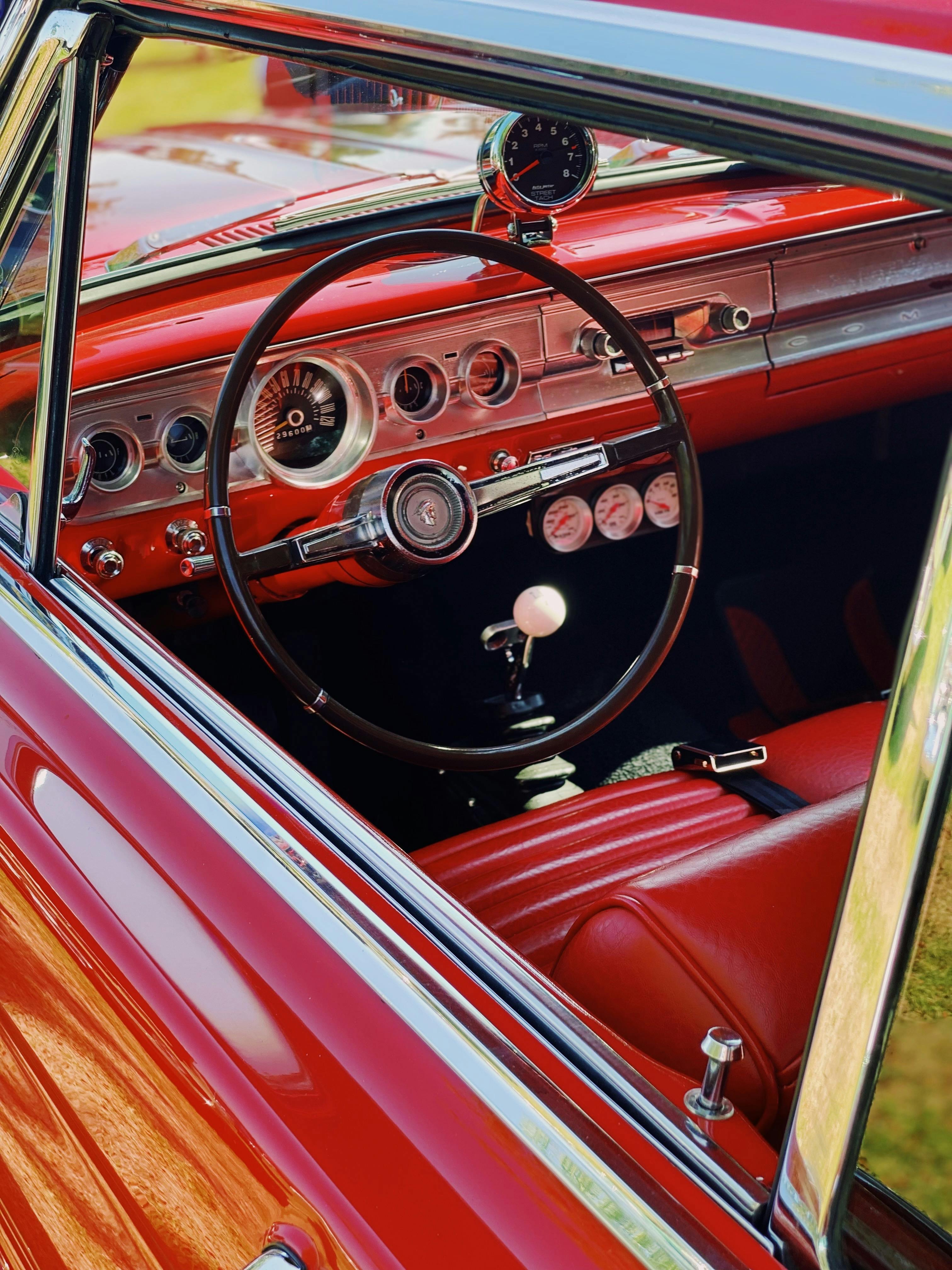 Interior of a Red Vintage Car · Free Stock Photo
