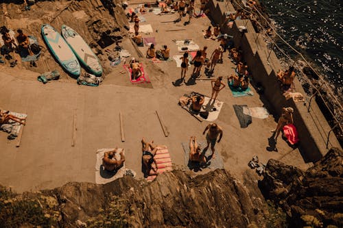 Top View of People on Coastline on Summer Day