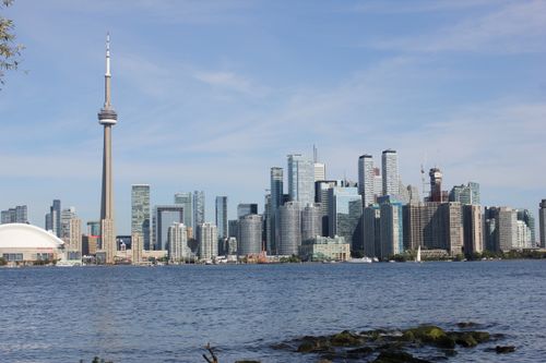 Free Stunning daytime view of Toronto's skyline featuring the CN Tower and waterfront. Stock Photo