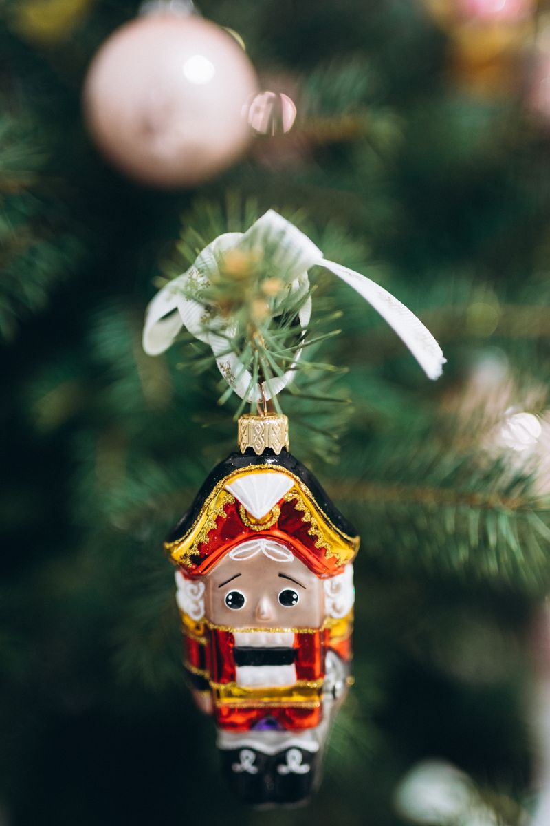 Festive Christmas decorations with nutcracker figurine and holiday lights