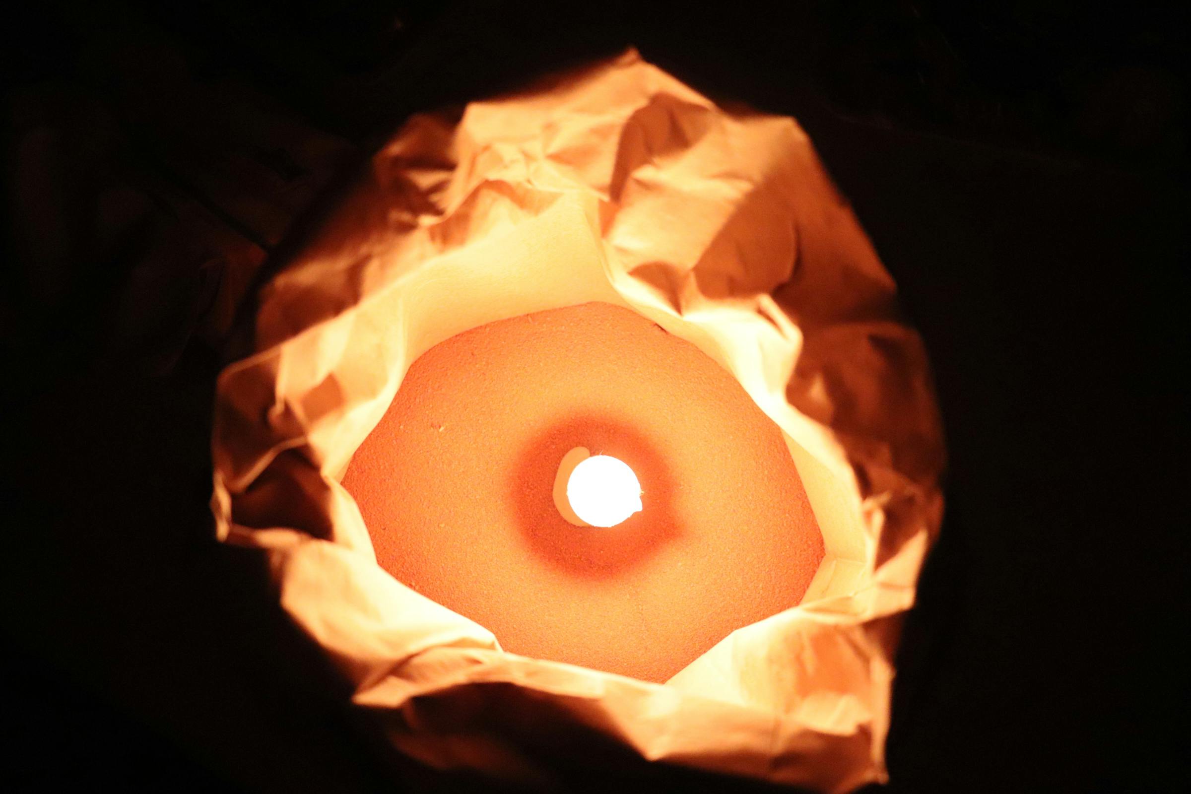 Naked couple embracing from behind, artistic back view showing intimate connection