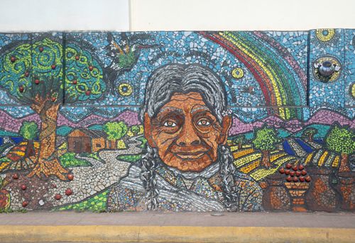 Free Colorful mosaic mural depicting cultural themes in Zacatlán, Puebla, Mexico. Stock Photo