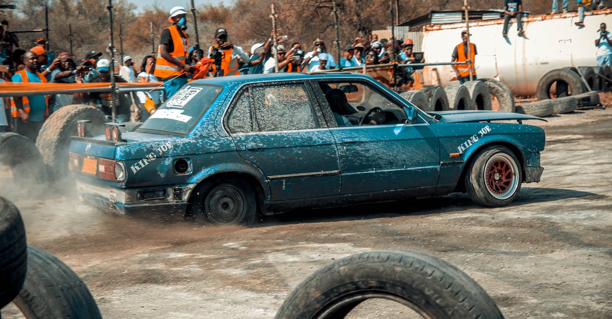 Exciting car race showcasing speed and skill in Palapye, Botswana with spectators watching.