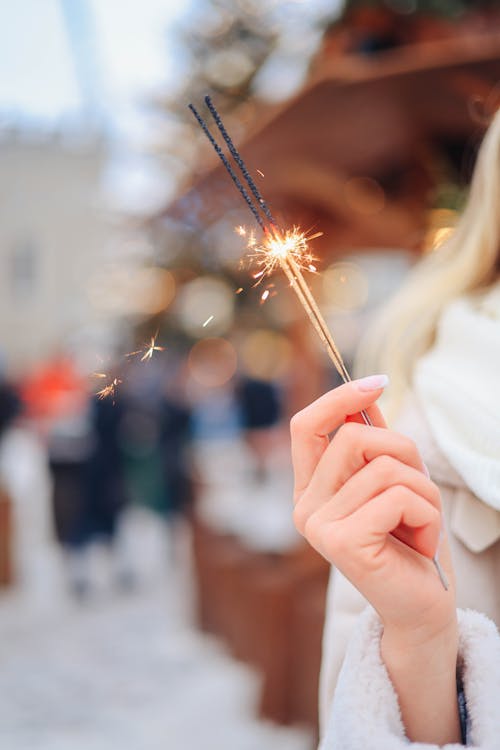 Hand Holding Sparklers