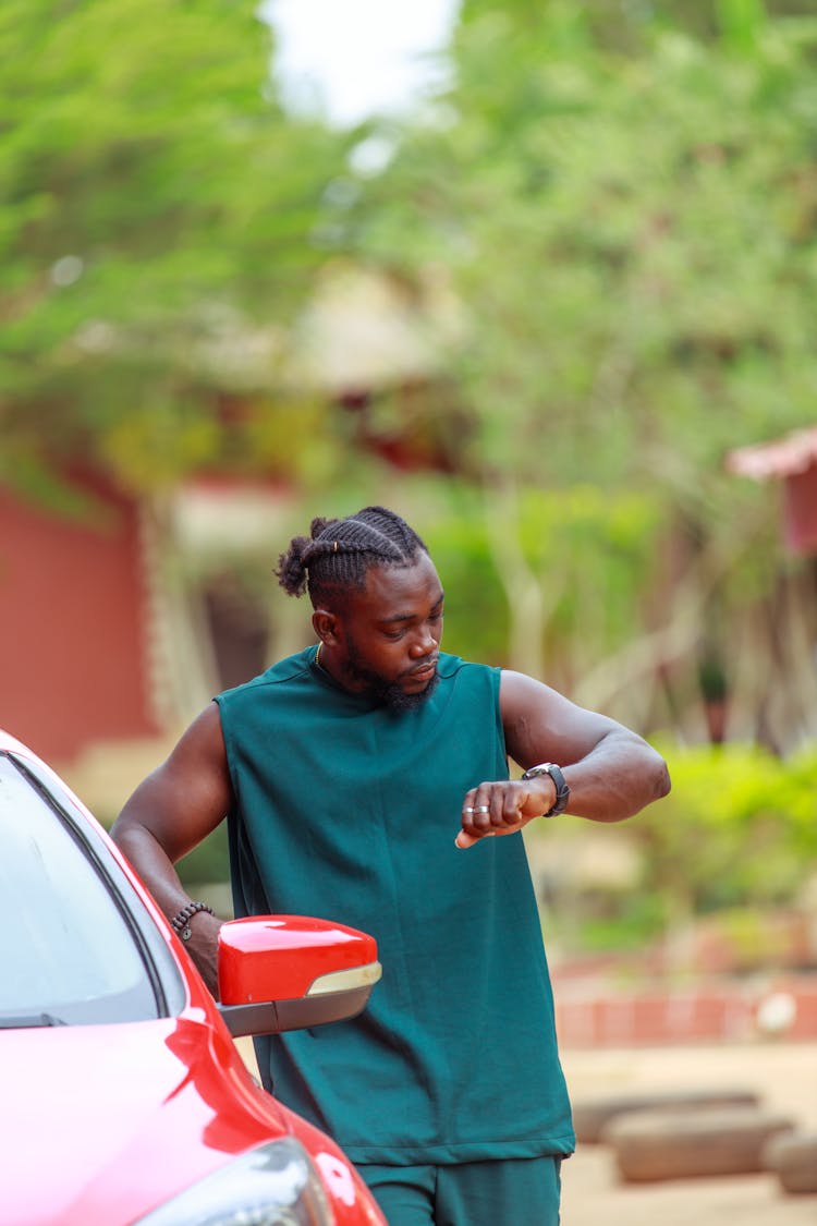 A Man Looking At His Watch