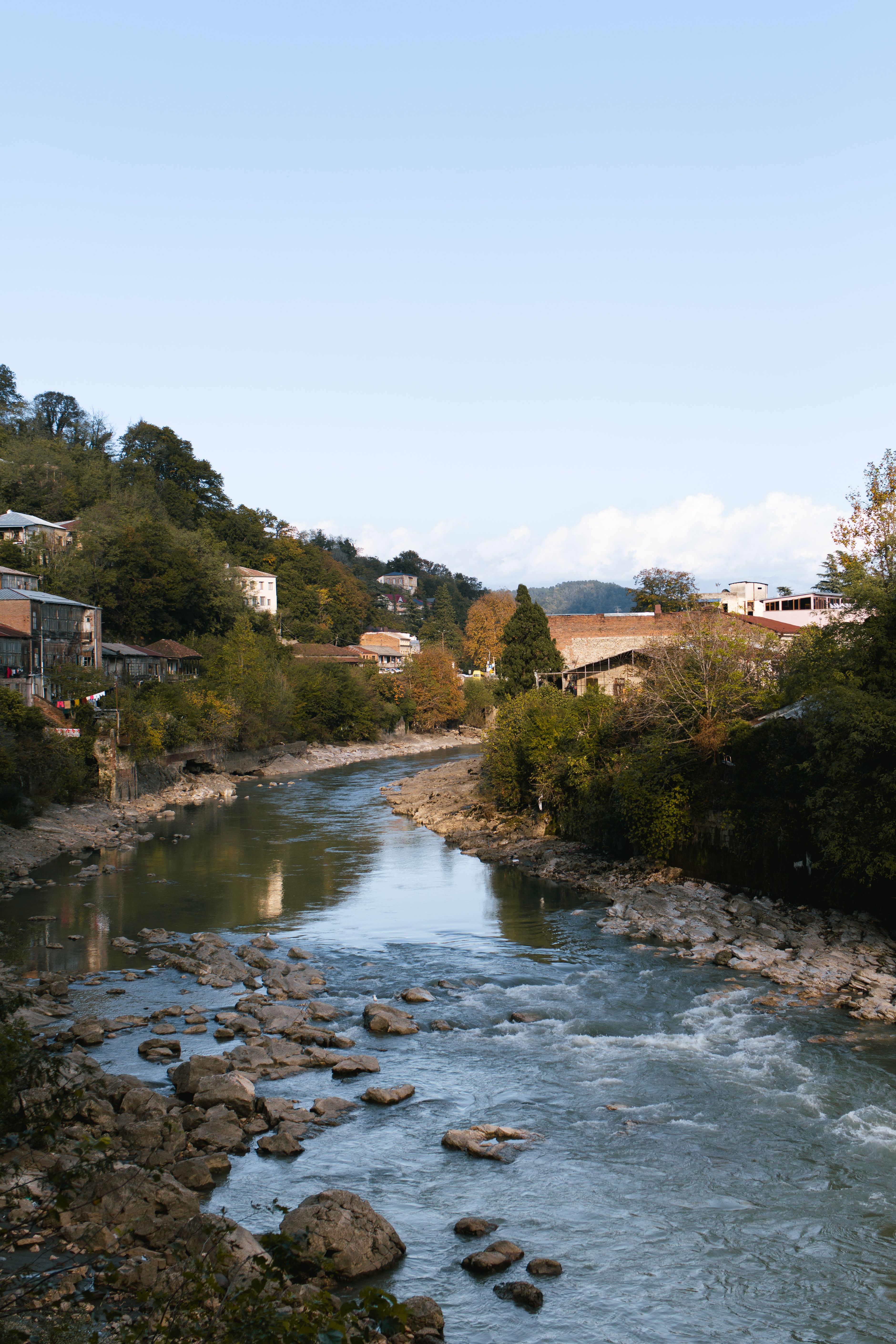 River in Village and near Forest on Hill · Free Stock Photo