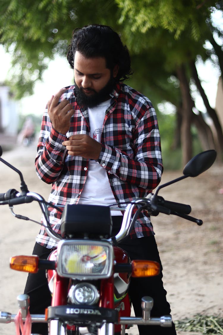 Bearded Man On A Motorcycle