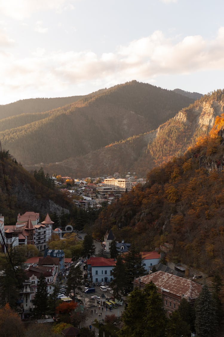 Houses In Valley In Mountains Landscape