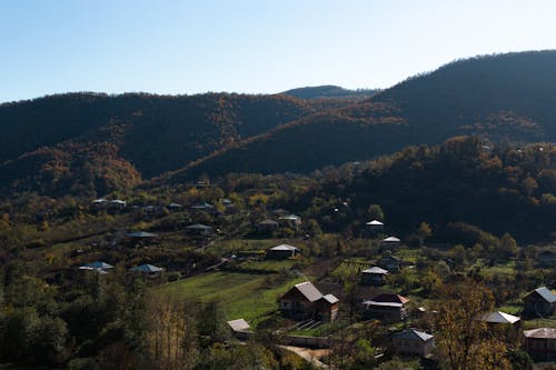 High Angle View of a Village Surrounded by Hills