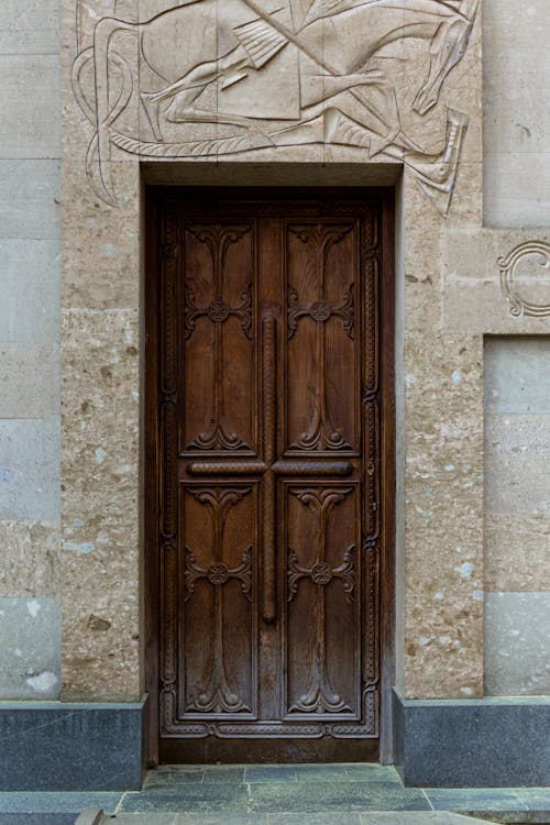 Free Photo of an Old Wooden Carved Door Stock Photo