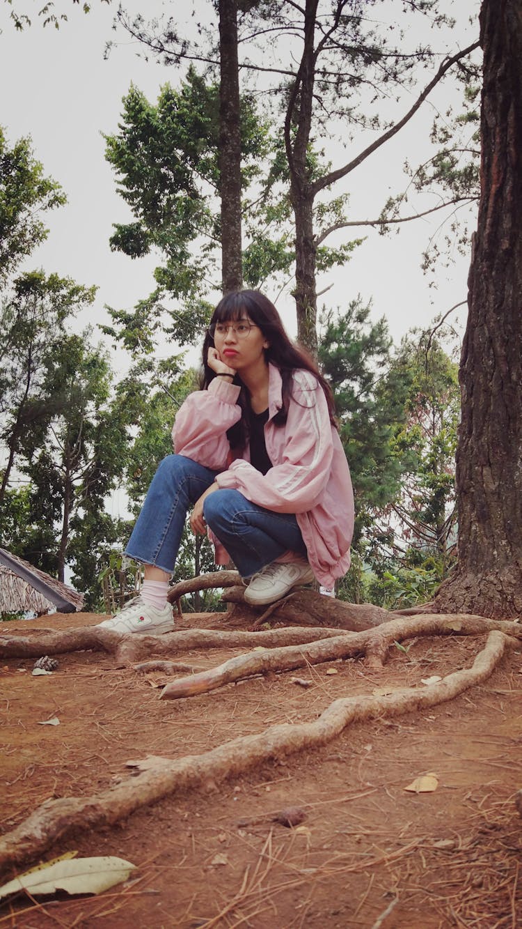 Woman Sitting Under Tree