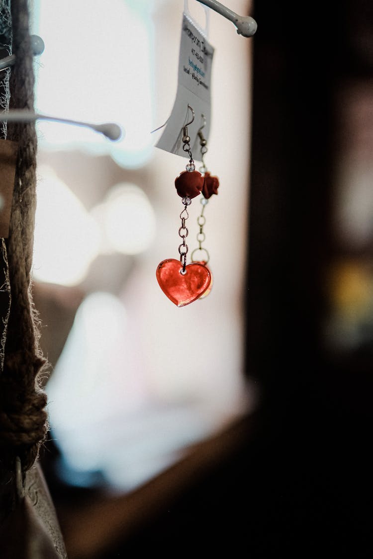 Close-up Shot Of Pair Of Earrings Hanging 