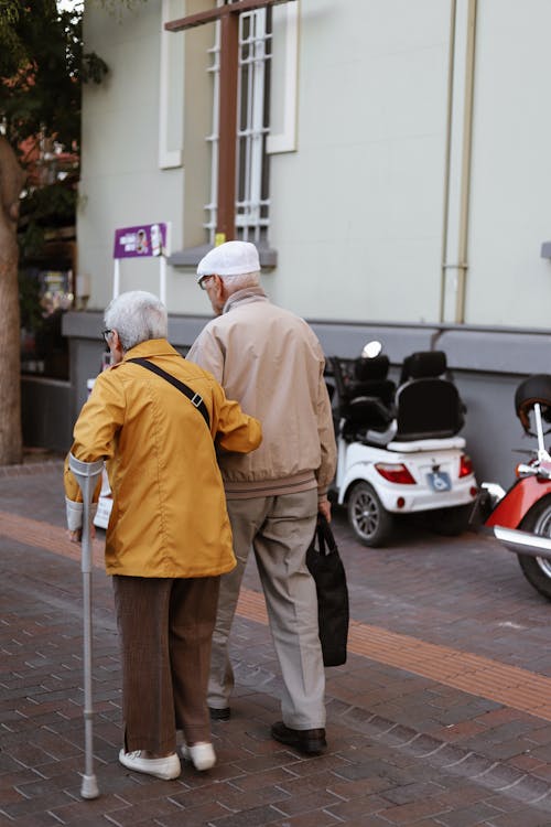 Elderly Couple Walking Together