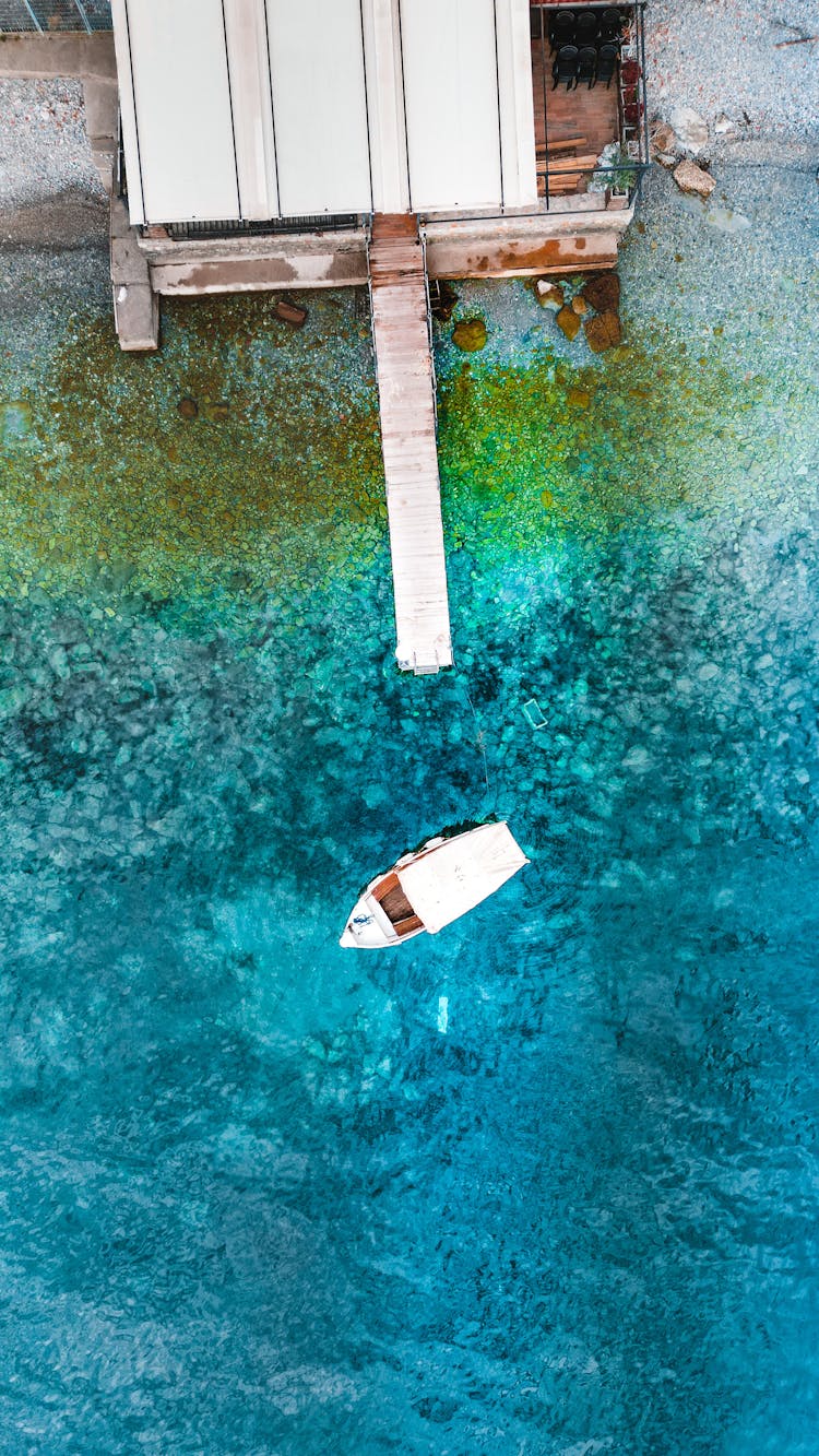 Aerial View Of A Boat On Water 