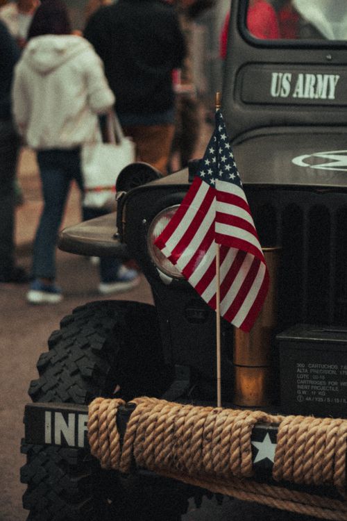 Free Close-up of a US Army jeep with an American flag in Tunja, Colombia. Stock Photo