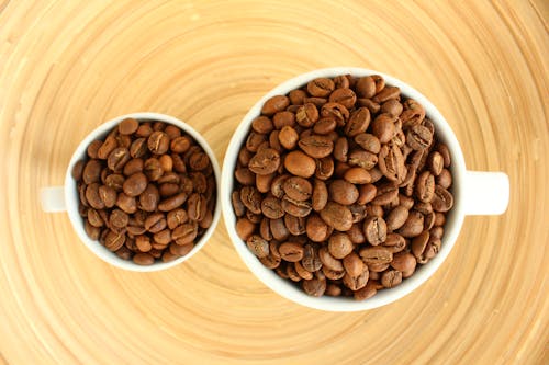 Free Top View Photo of Coffee Beans in Cups Stock Photo