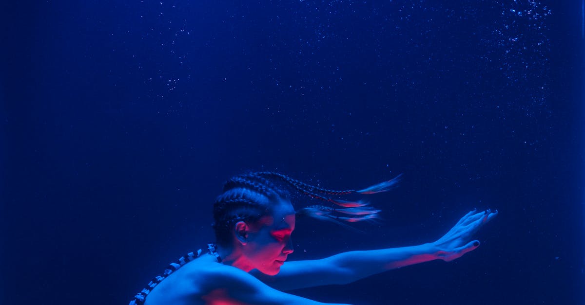 Photo of Woman Swimming Underwater · Free Stock Photo