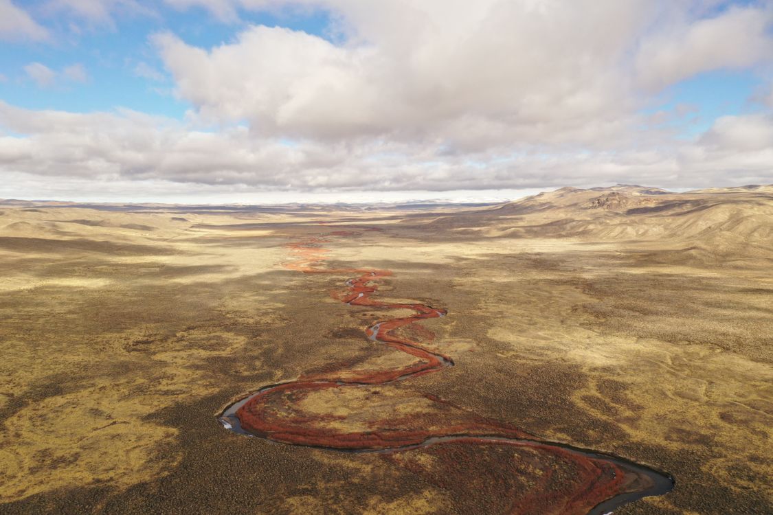 Aerial View of a Winding River in the Middle of a Desert · Free Stock Photo