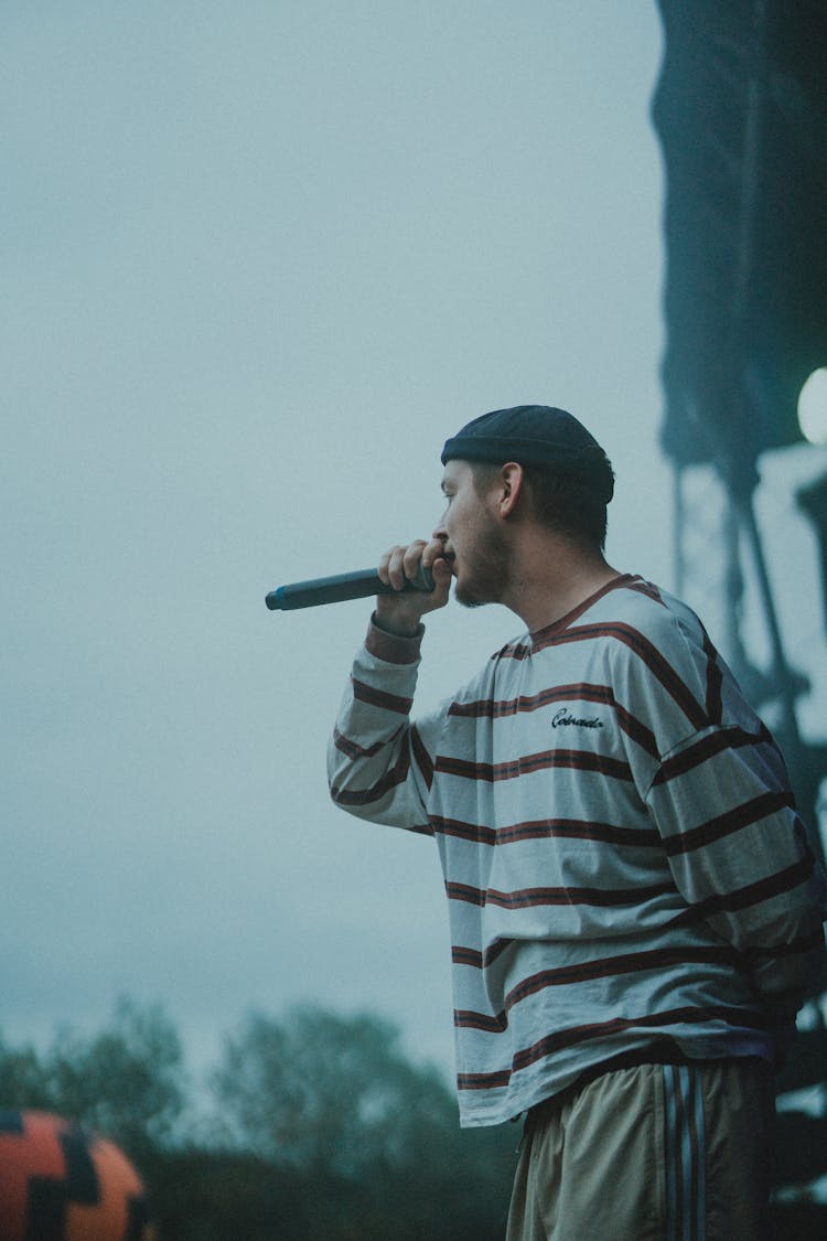 Photo Of A Man Singing