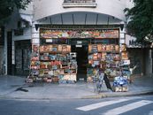 Vibrant street-side fresh produce shop in Buenos Aires, showcasing colorful fruits and vegetables.