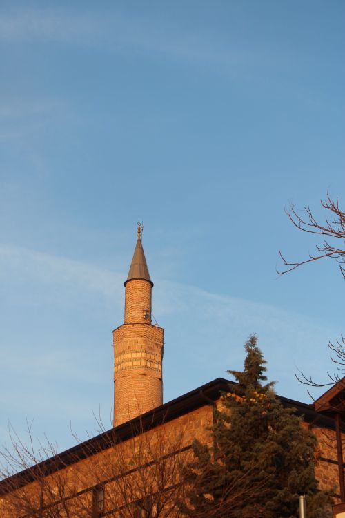 Free A beautifully captured low angle shot of a minaret against a clear blue sky. Stock Photo