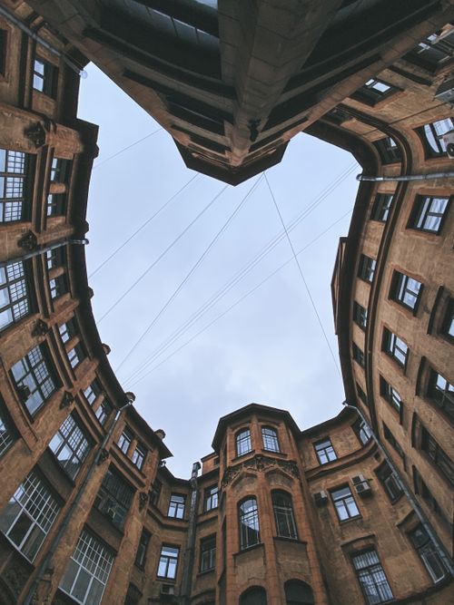 Free Upward view of historic circular courtyard architecture in Saint Petersburg, Russia. Stock Photo