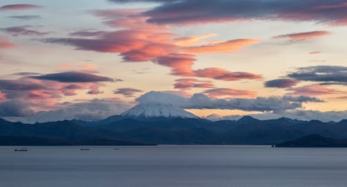 Snow Capped Mountain near Body of Water