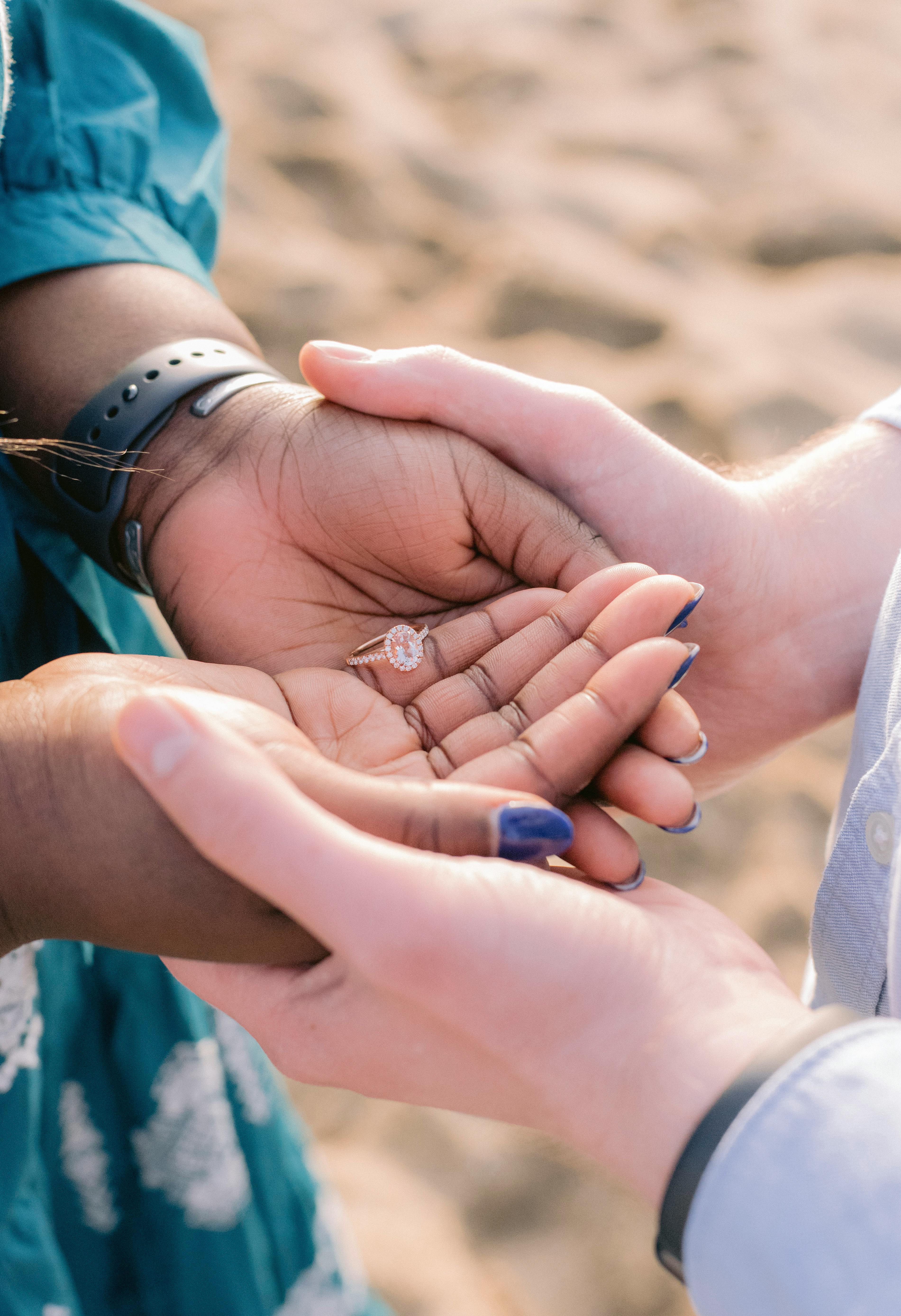 Engagement ring with couple on sale hand