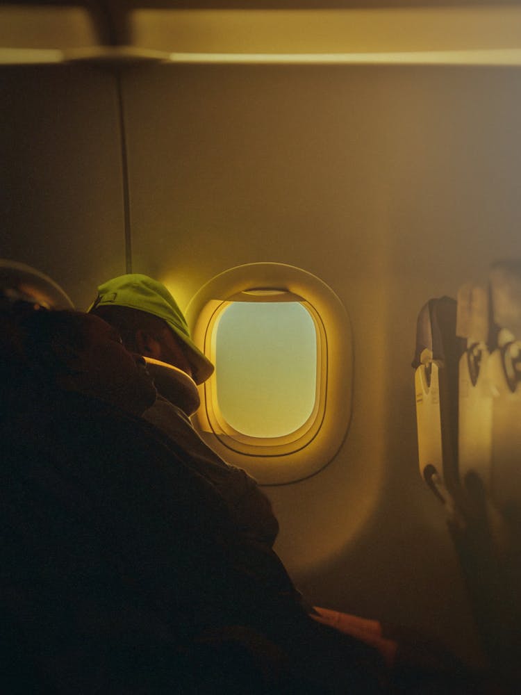 People Sleeping Inside An Airplane