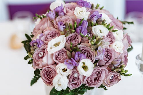 Close-up Photo of Pink and White Faux Rose Bouquet