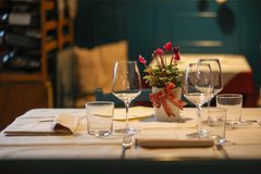 Warm dining room interior — photo by Toni Canaj on Pexels