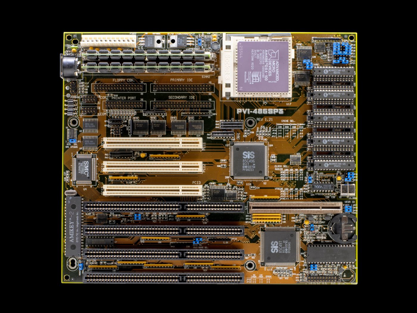 Detailed close-up of a vintage motherboard showcasing electronic circuits and components.