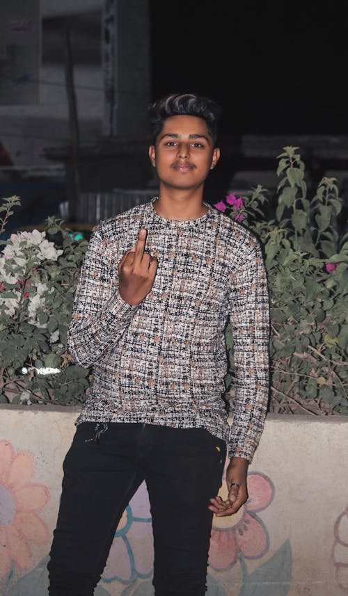 Young Man Showing Middle Finger