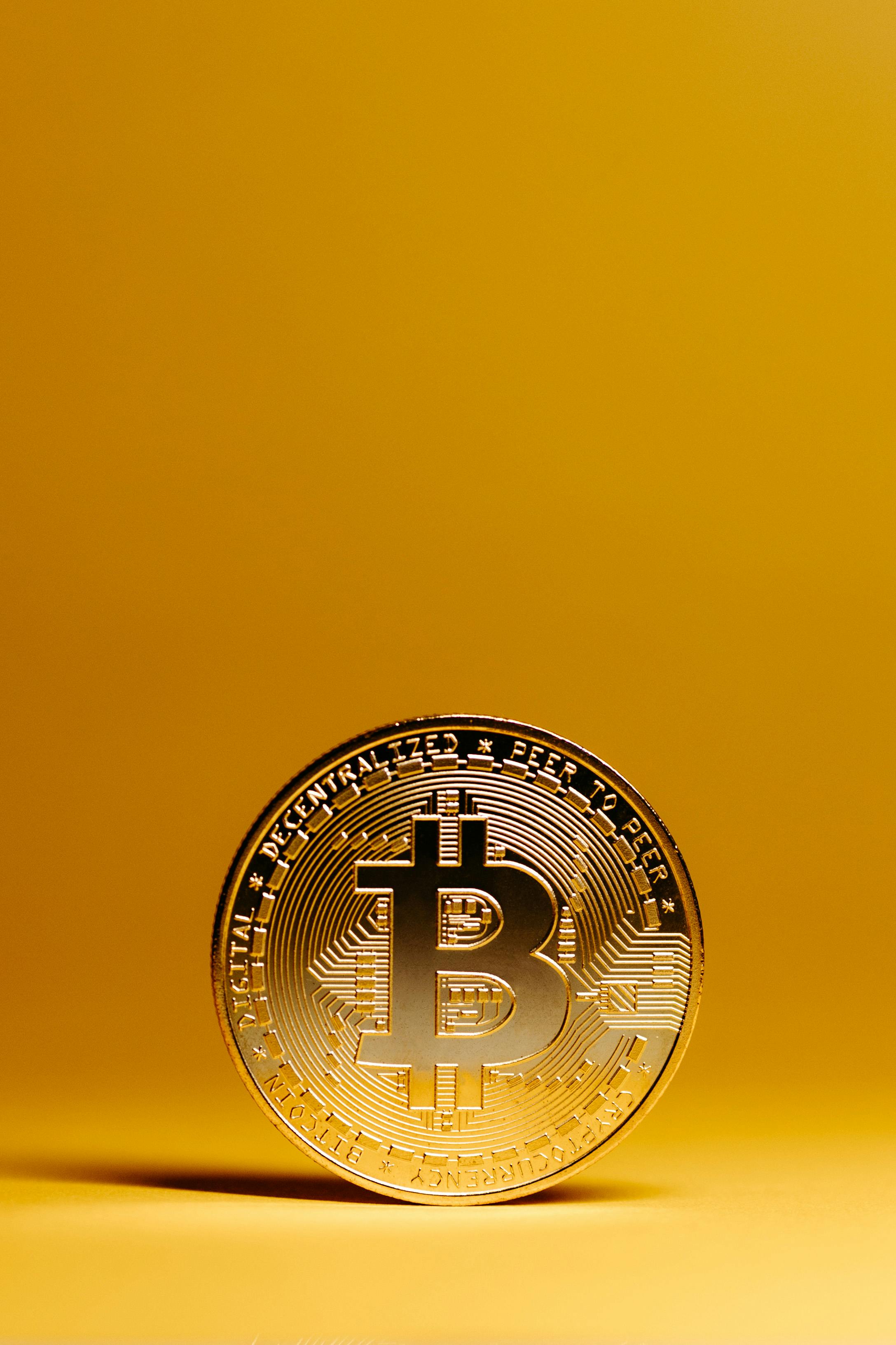 bitcoin on yellow background