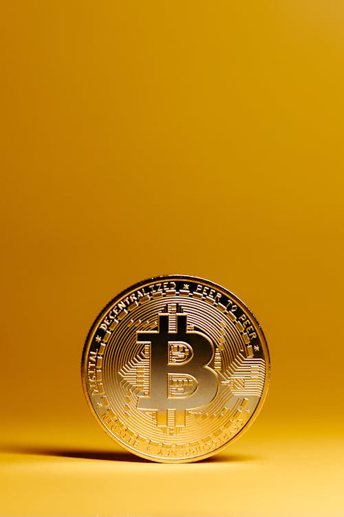 Bitcoin on Yellow Background