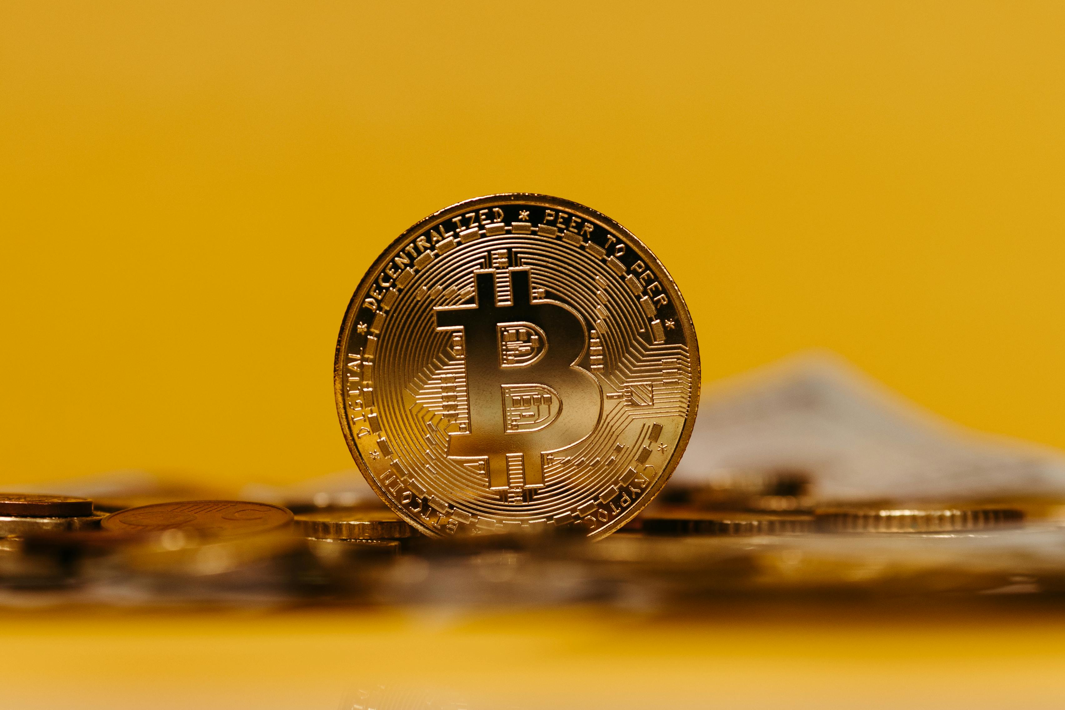 bitcoin on yellow background