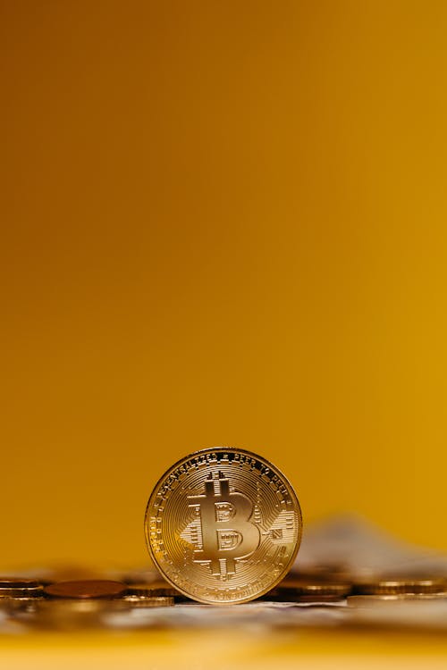 Bitcoin on Yellow Background