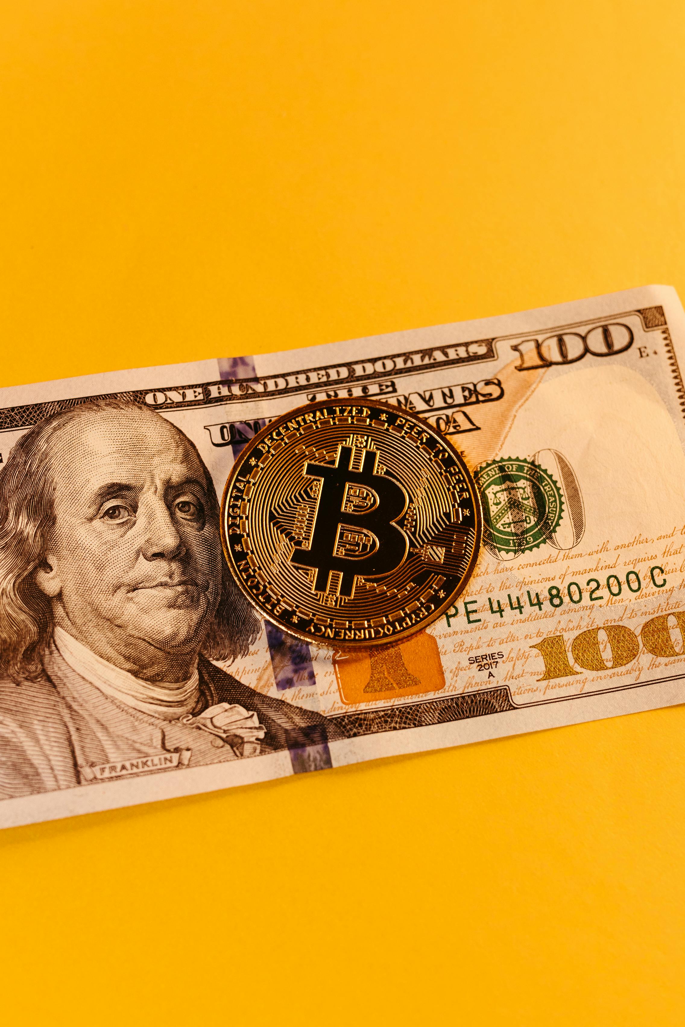 Bitcoin And Dollar Banknote On Yellow Background Free Stock Photo bitcoin-and-dollar-banknote-on-yellow-background-free-stock-photo