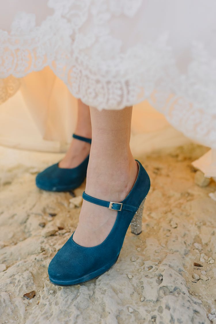 Feet In Blue High Heels