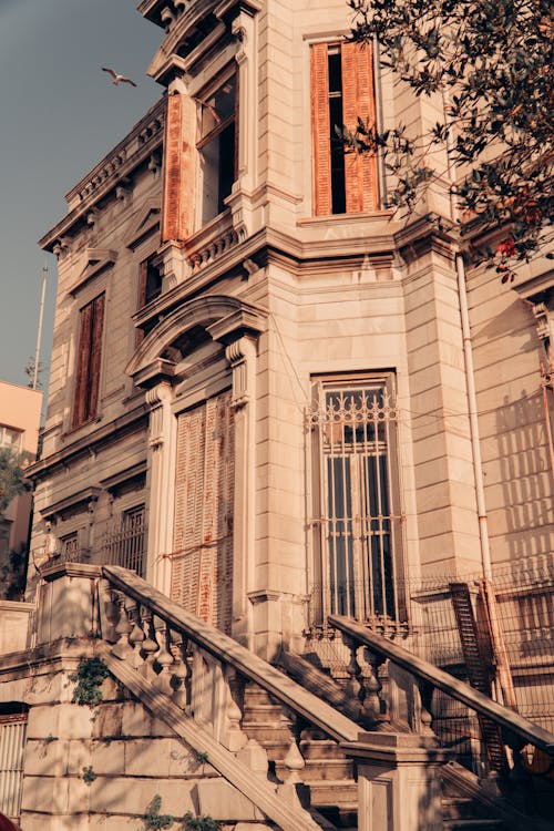 Stairs to Building with Sunlit Wall