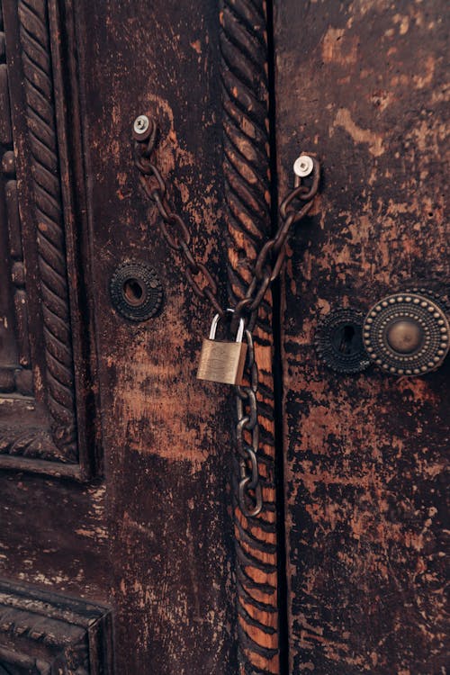 Wooden Double Doors with a Padlock