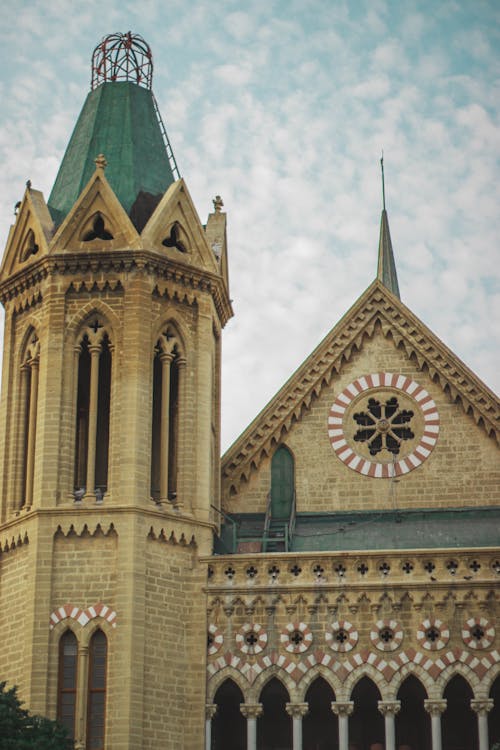 Frere Hall Exterior under Cloudy Sky 