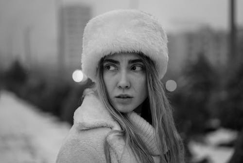 Black and White Portrait of Woman in Fur Hat