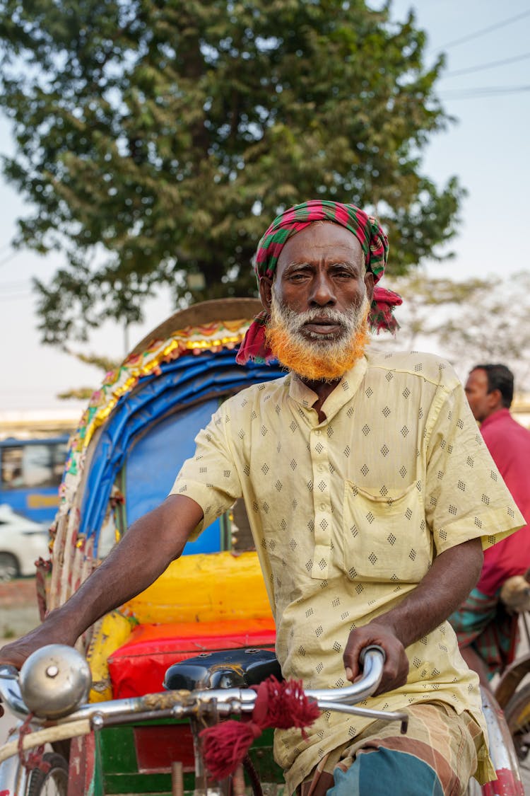 Man In Turban On Rikshaw In Asian Street