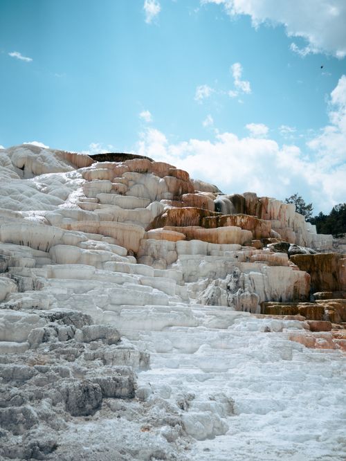 Free Breathtaking view of the Mammoth Hot Springs travertine terraces in Yellowstone, showcasing nature's artistry. Stock Photo