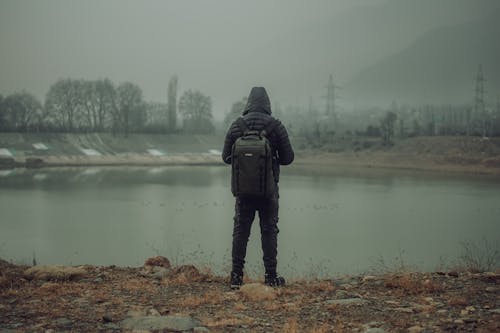 Man Looking at Lake