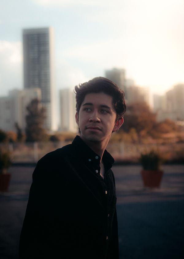 A member looking out over the city at dusk — photo by Santiago Sauceda Gonzalez on Pexels